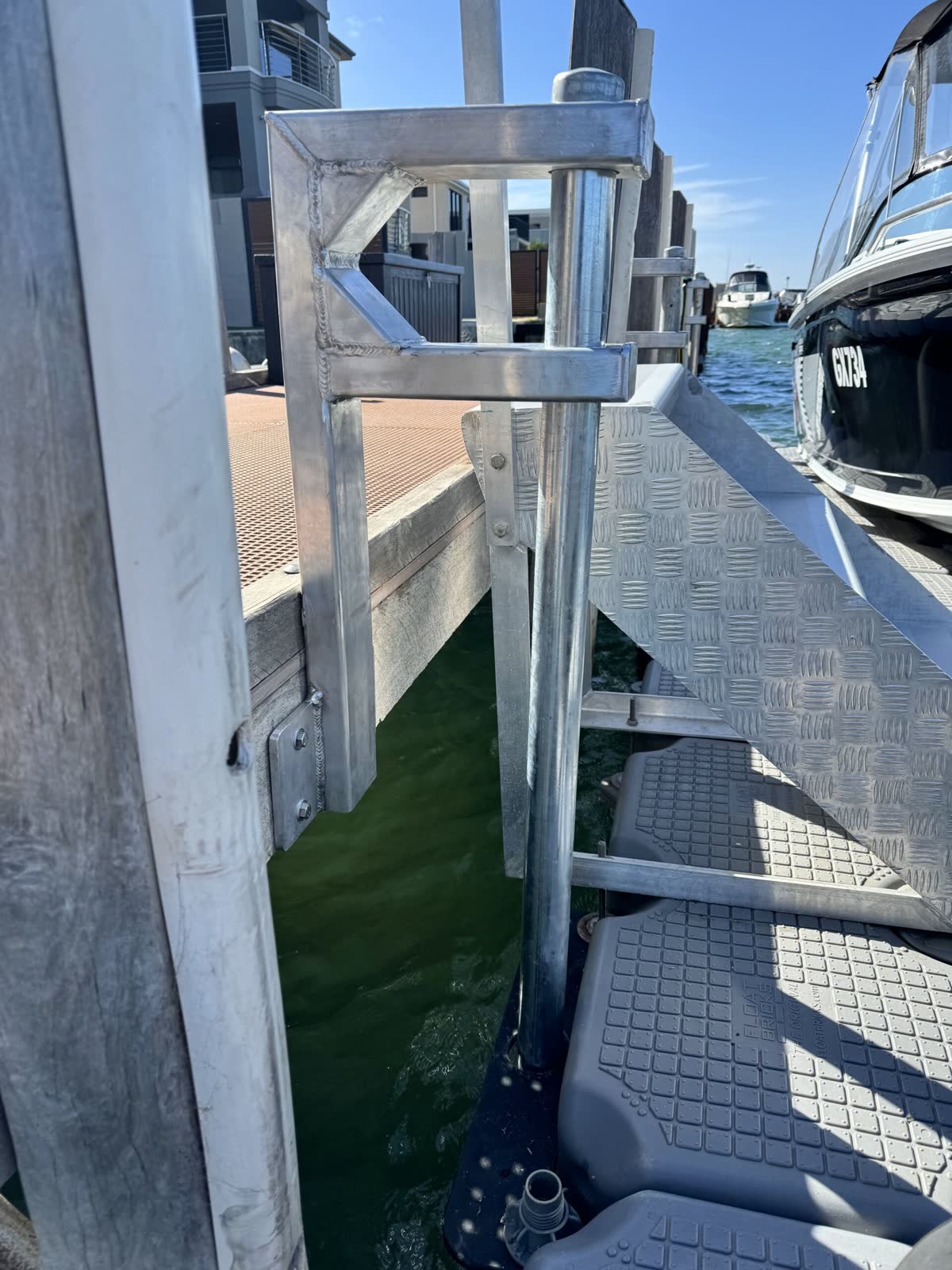 Close up of a floating dock system and aluminium cleat