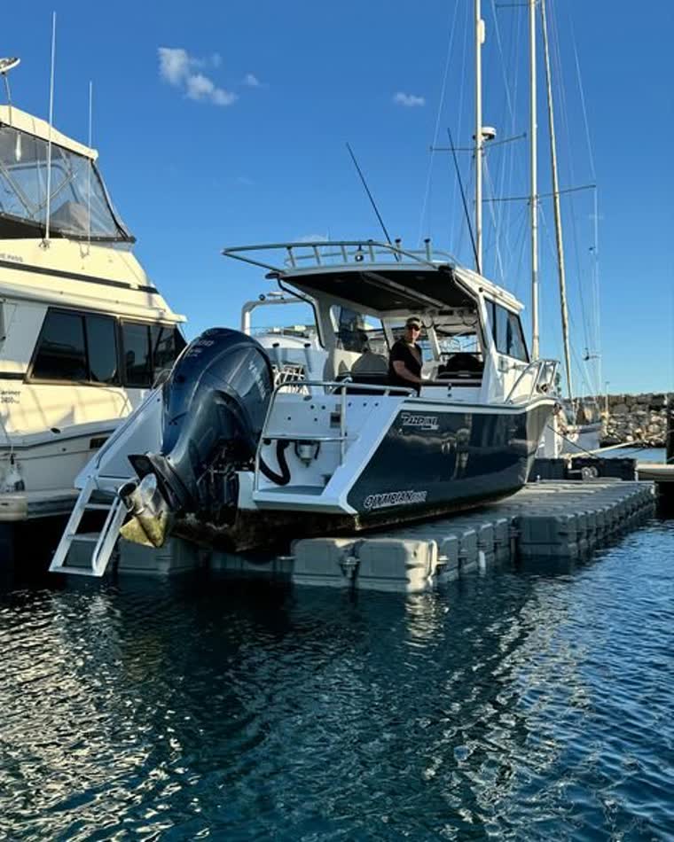 A person on a docked boat