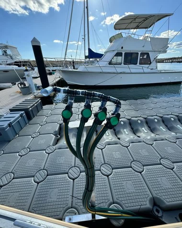 Floating boat lift system on a floating dock